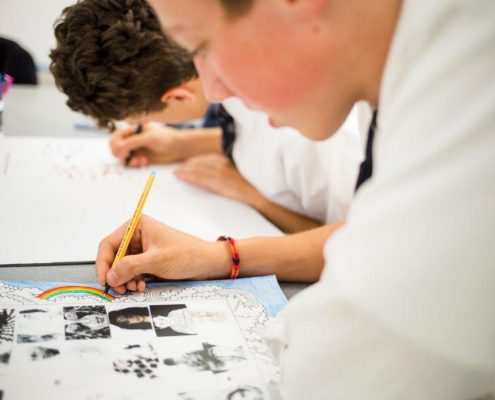 artd Image of two students drawing.